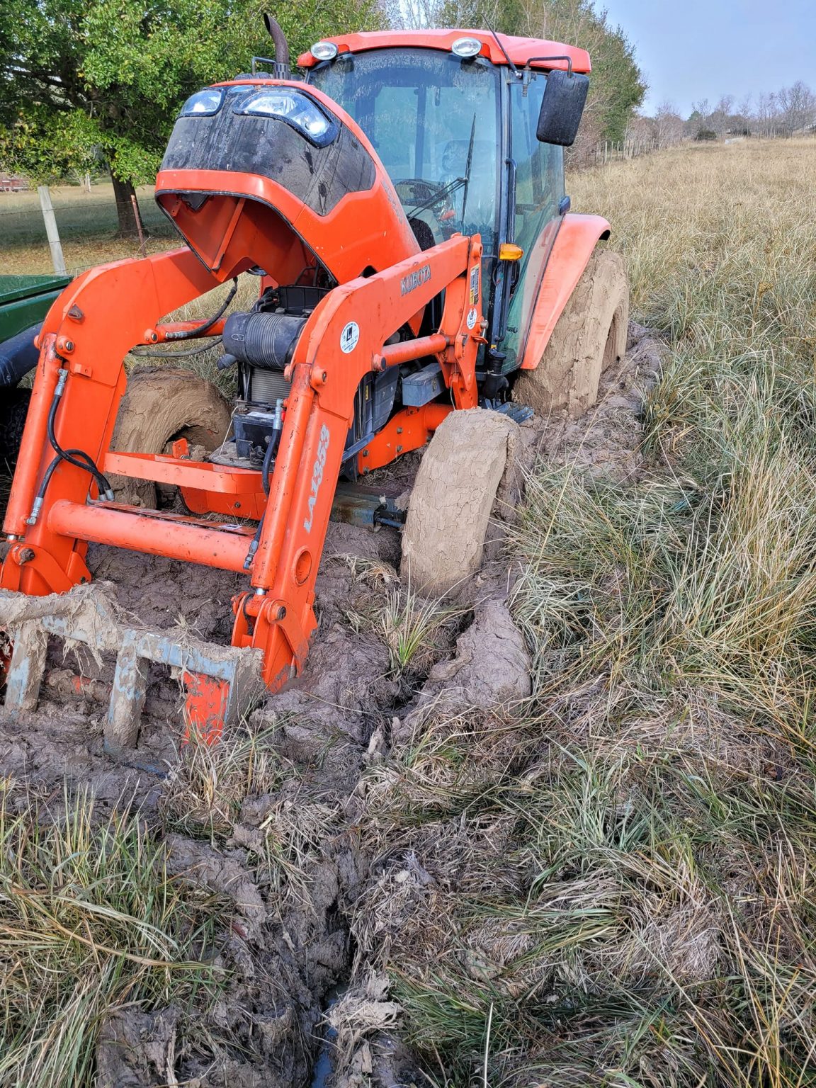 Tractor stuck in mud in Texas Offroad Portal