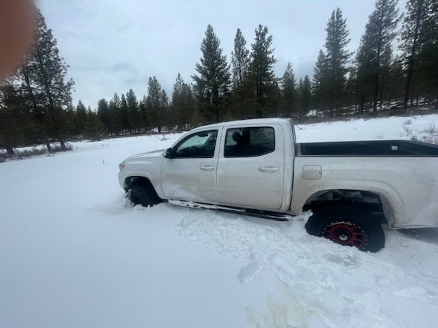 Matthew's tacoma stuck in the snow