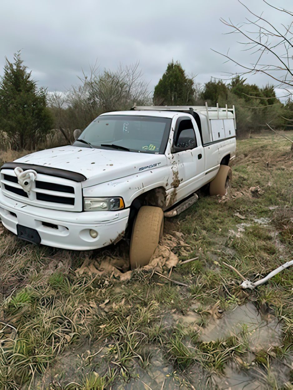 Dodge pickup stuck in mud in Tennessee offroad recovery tennessee