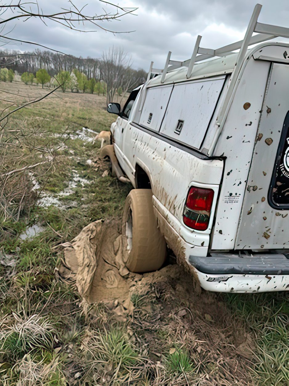 Dodge pickup stuck in mud in Tennessee