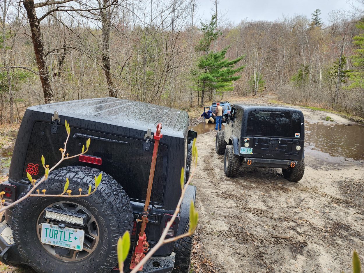 mud puddle, both jeep had to pull together