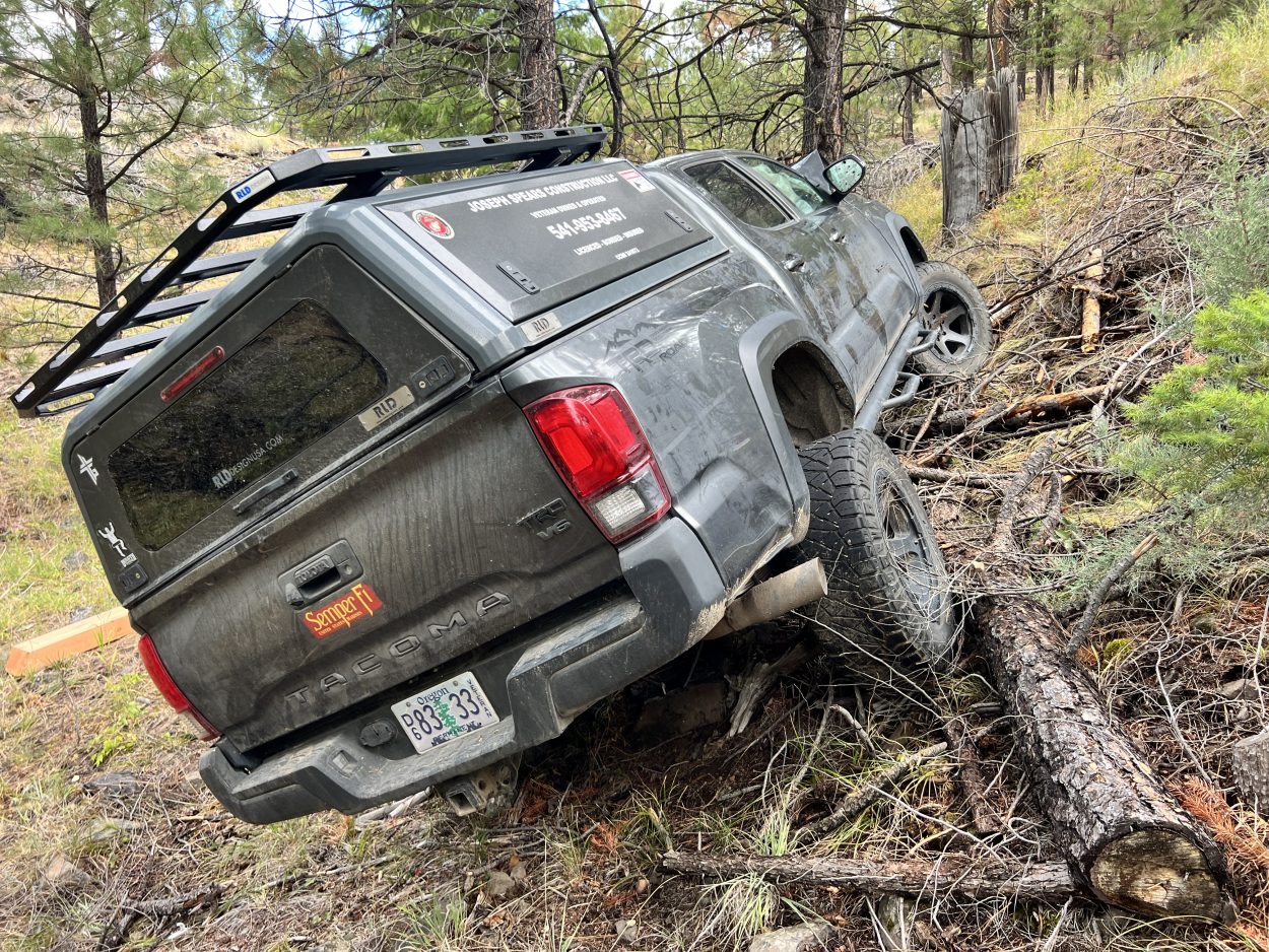 Overlanding Tacoma crashed into a tree