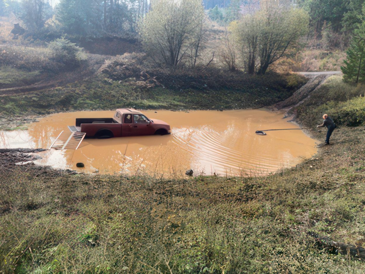 truck stuck in pond