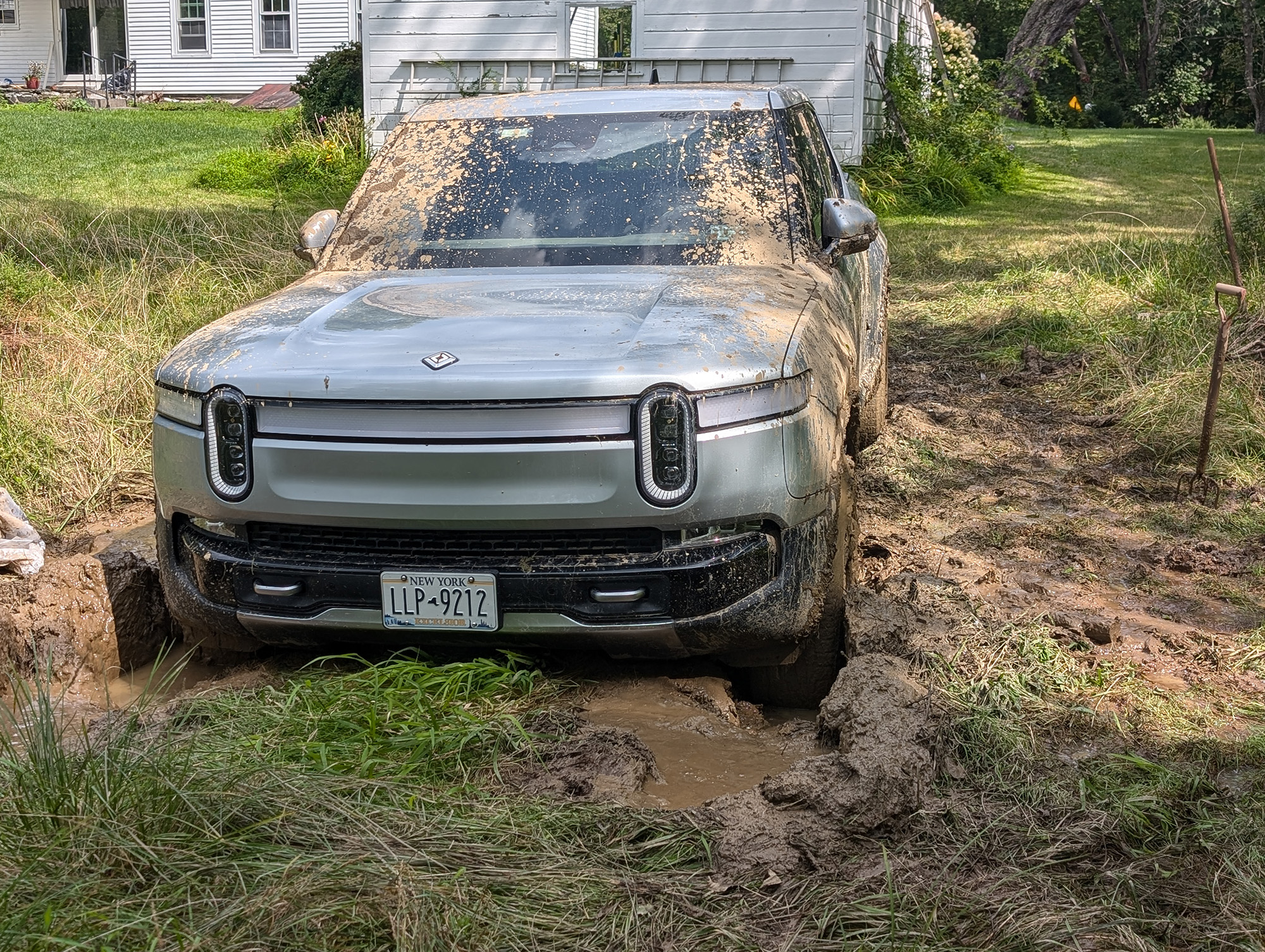 Rivian R1T 4 wheel drive stuck in deep mud