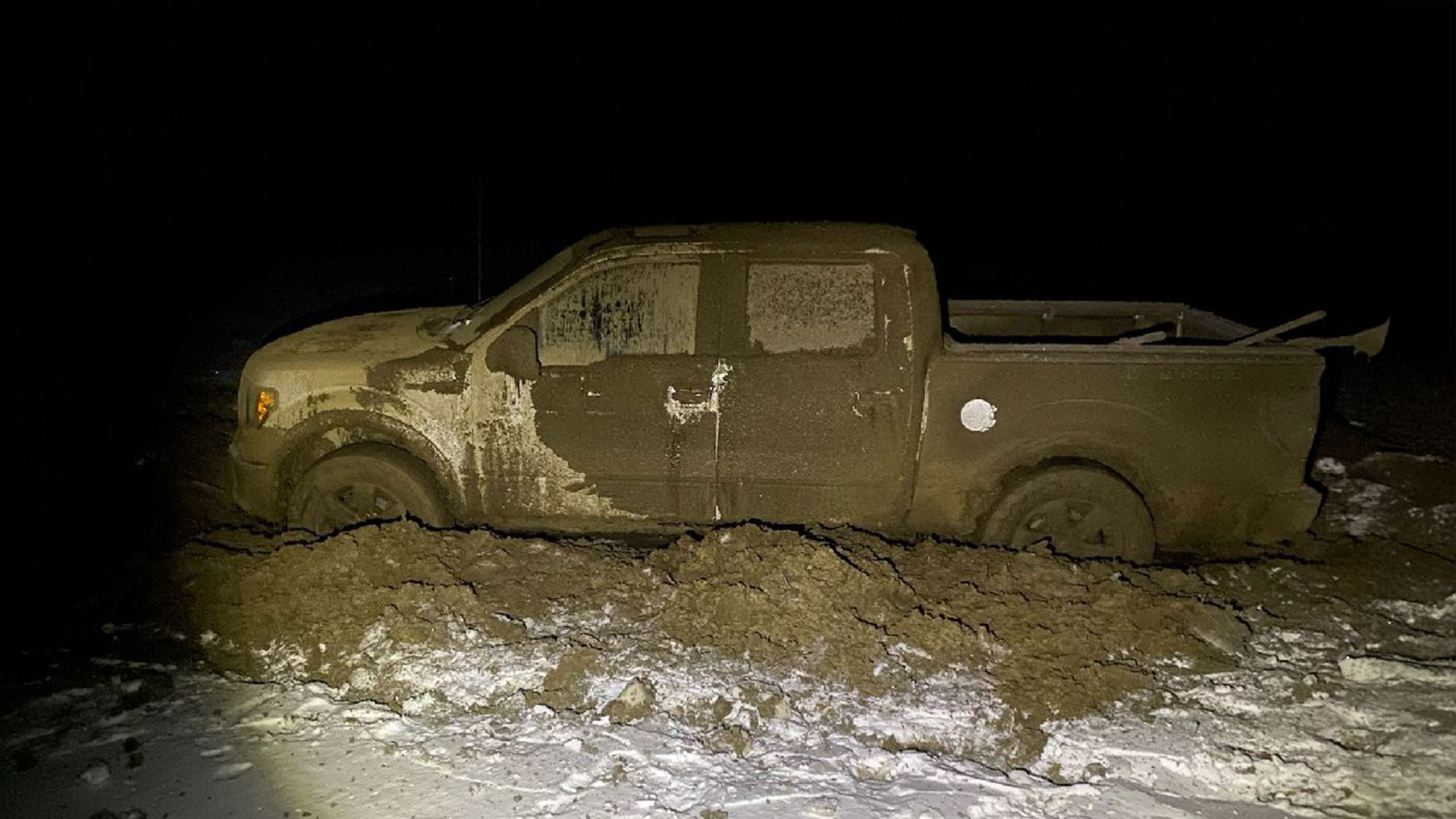 Truck stuck in an icy field