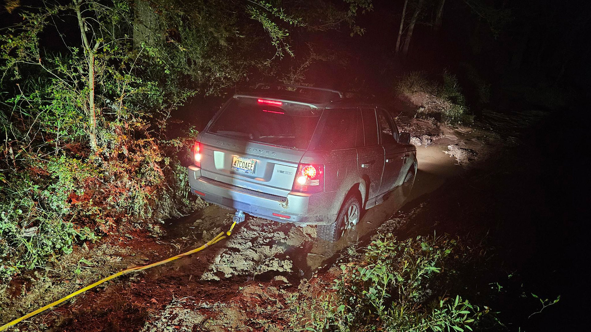 Range Rover bottomed out in a mud hole