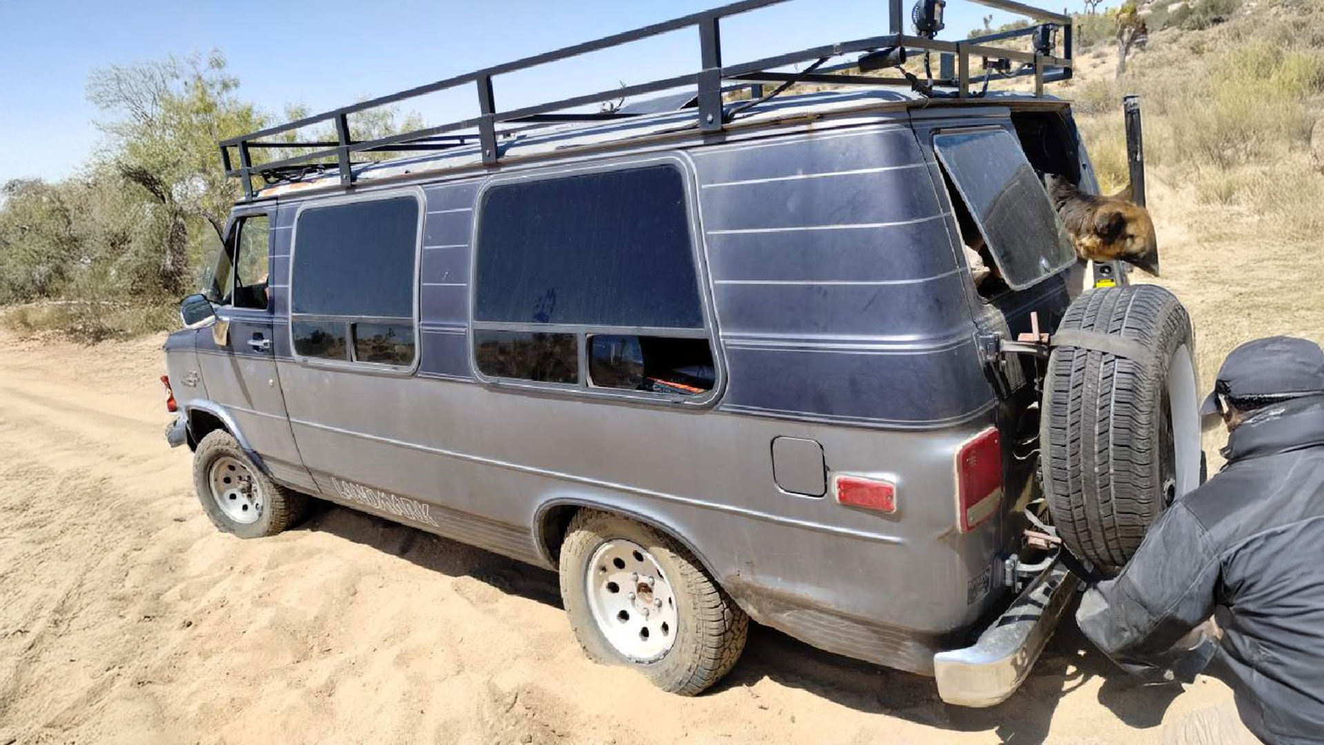 Van stuck in deep sand