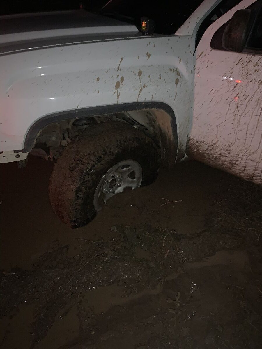 offroad recovery in California GMC sierra rwd stuck in mud