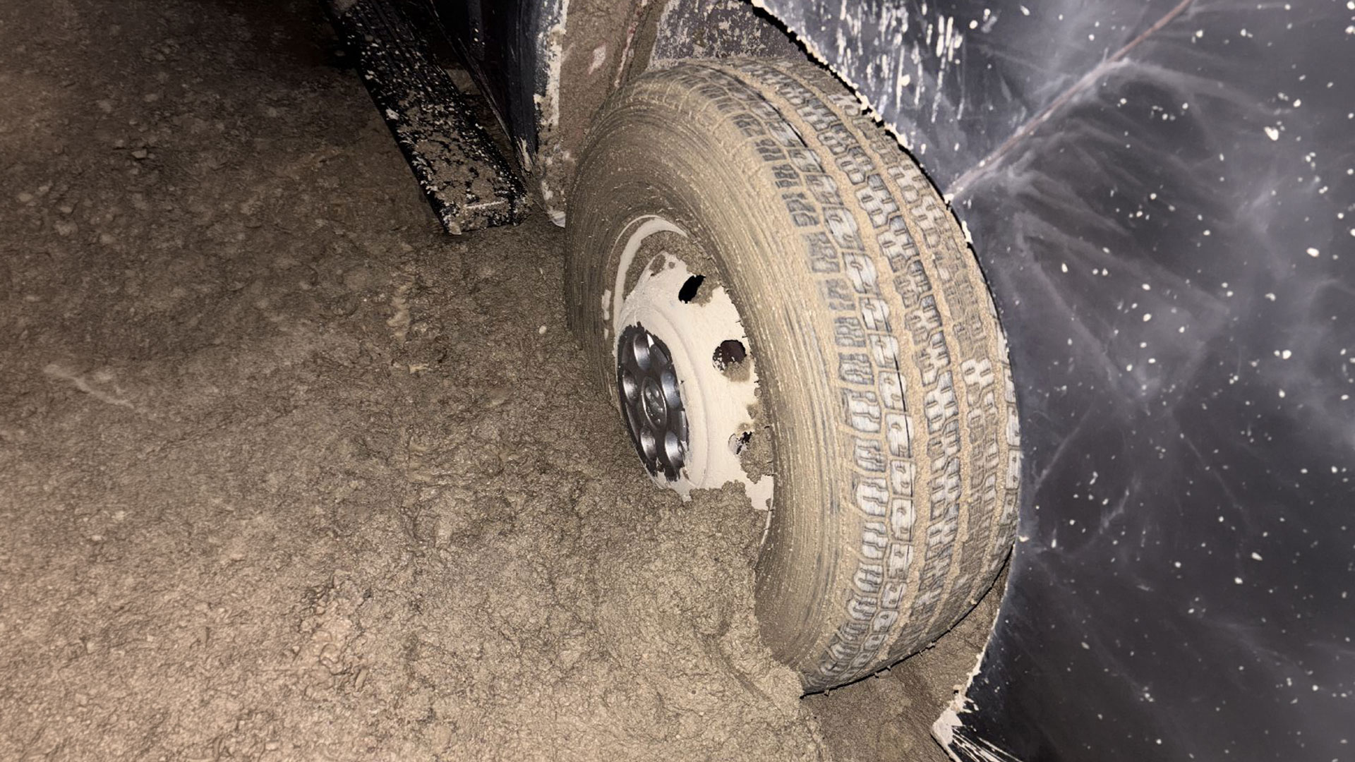 Front wheel stuck in mud