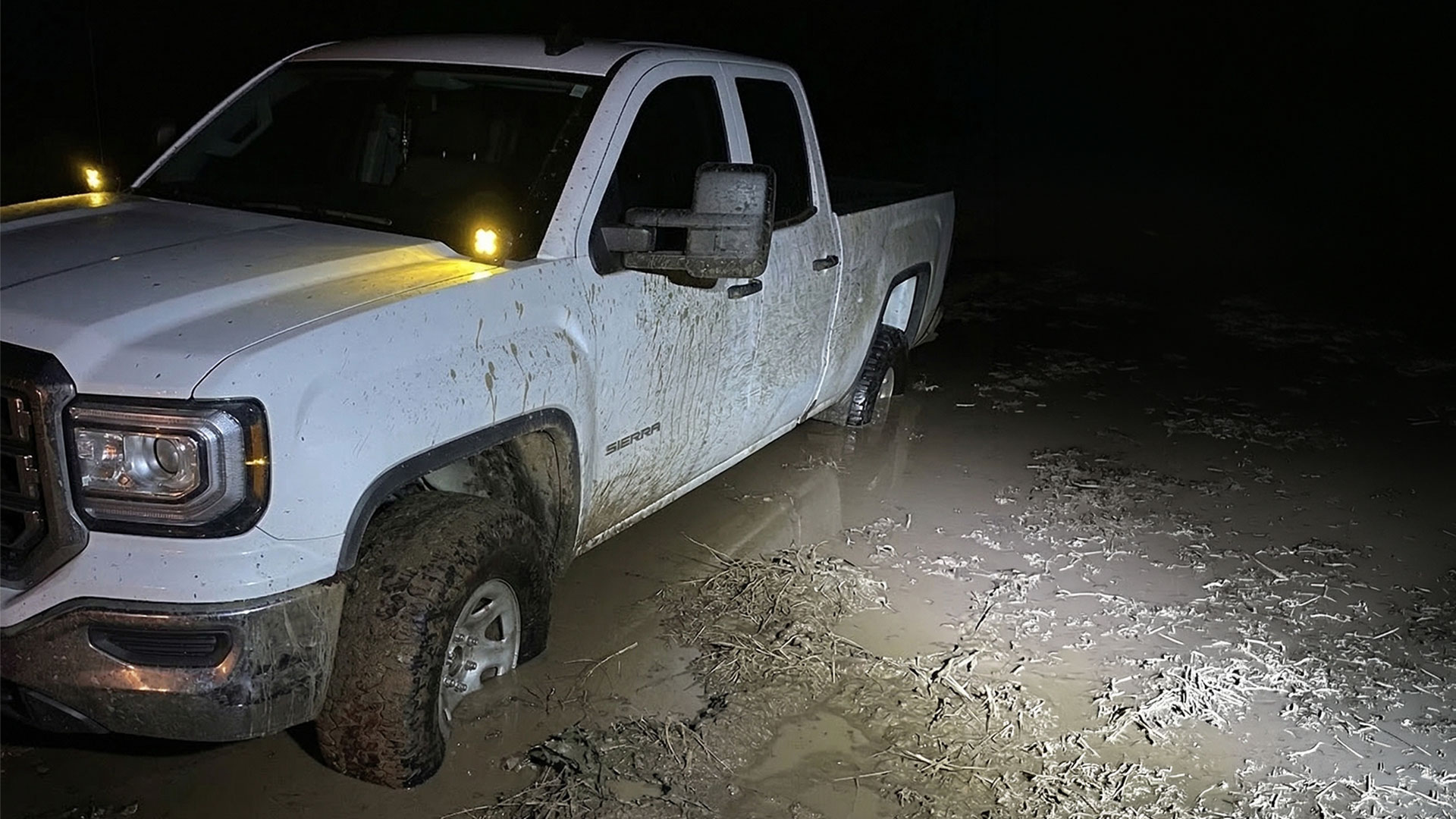 GMC sierra rwd stuck in mud