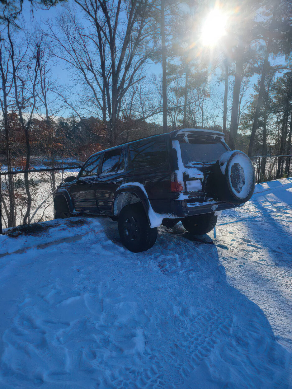 Toyota Hilux Surf 4x4 diesel is halfway off a cliff north carolina 4x4 rescue