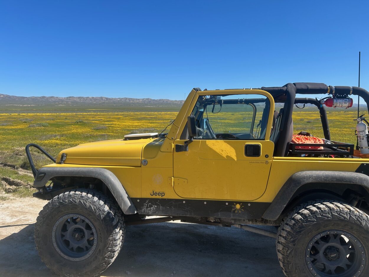 Jeep Gladiator and a small trailer stuck 