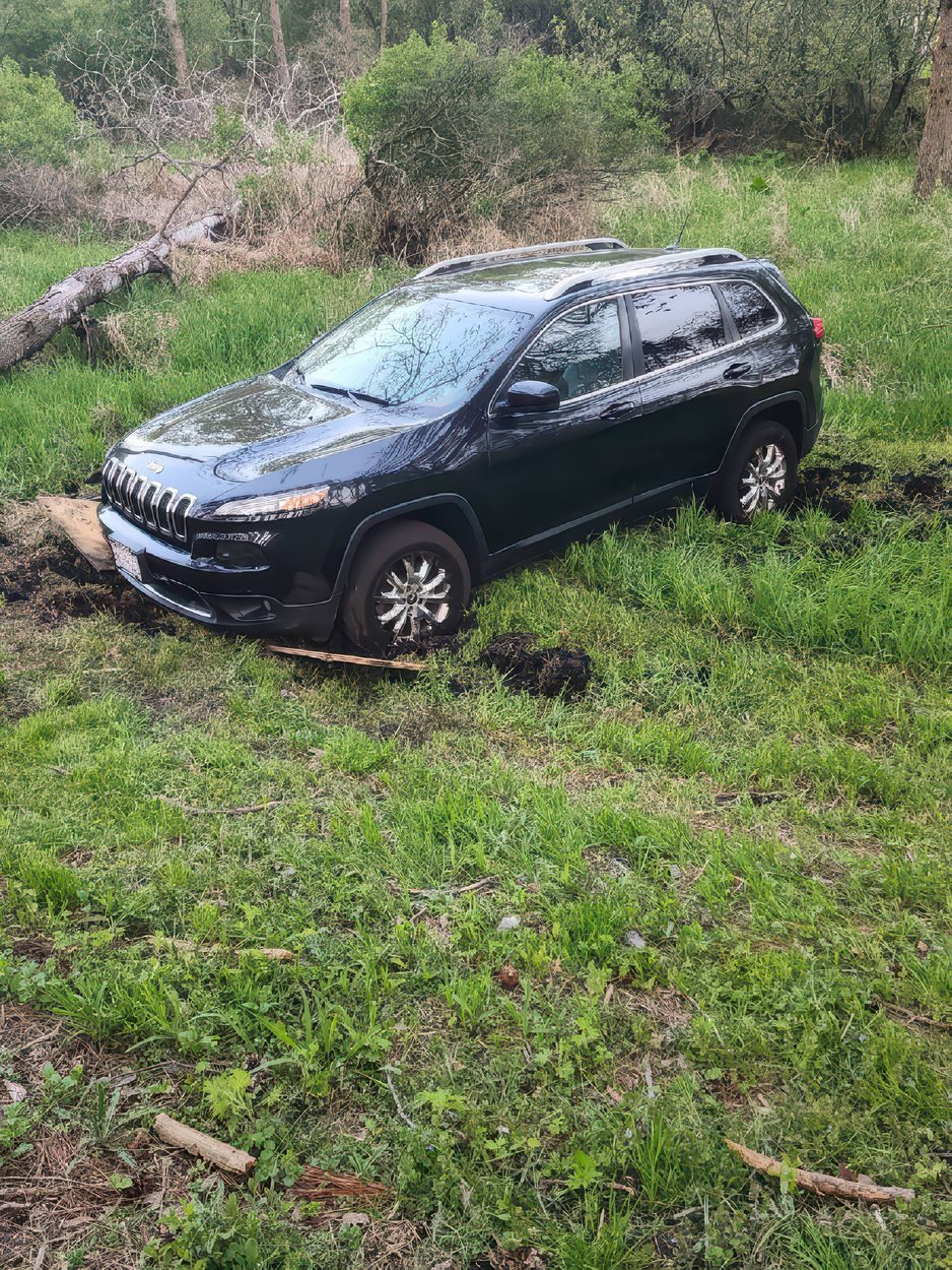 Stuck in the mud, pretty much bottomed out offroad recovery in Wisconsin